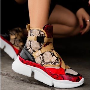 Miss Lola NonStop sneakers in red Size 9